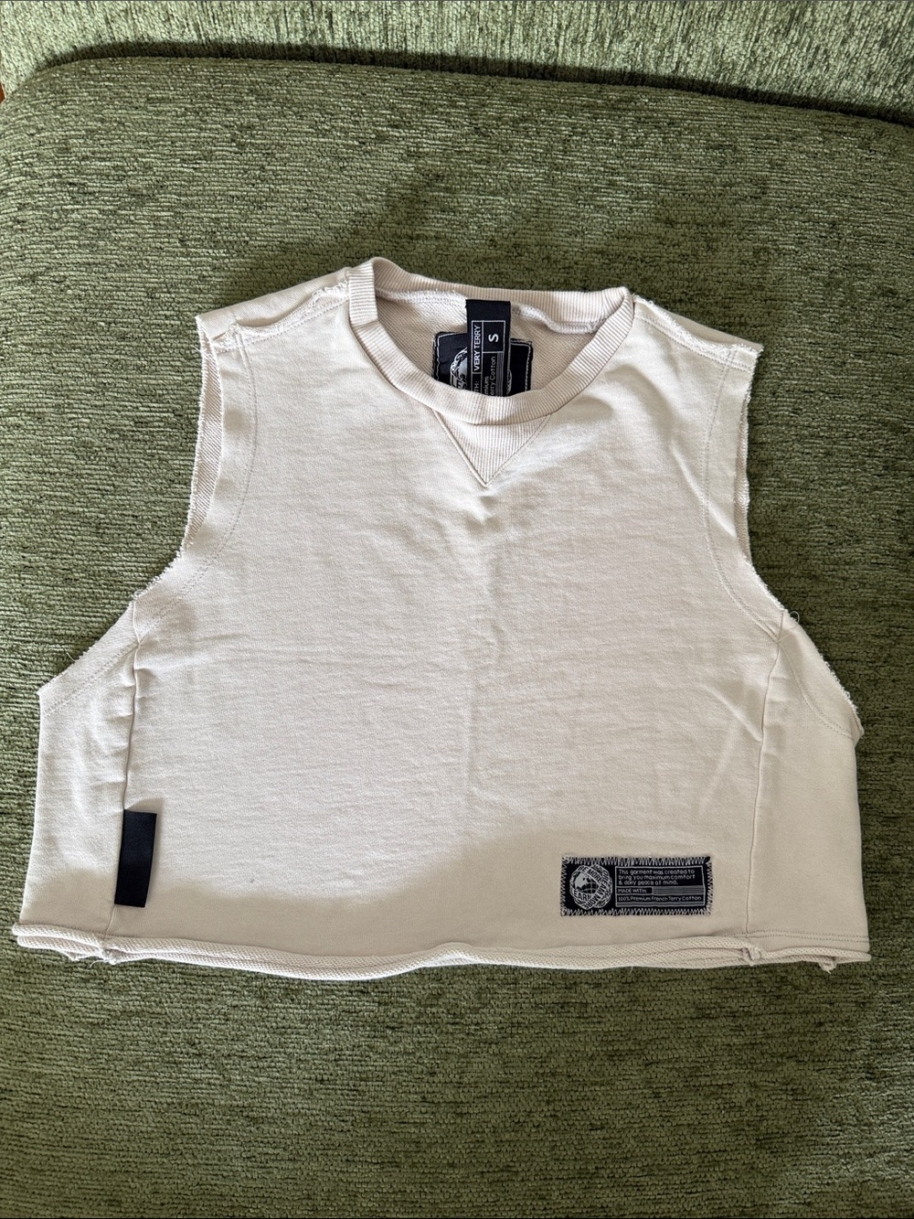 Alphalete Cropped Sleeveless Tank in Off-White